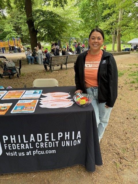 Shannon Lutz, PFCU Business Development Specialist, connecting with attendees and distributing PFCU literature and giveaways during the Spruce Hill May Fair.
