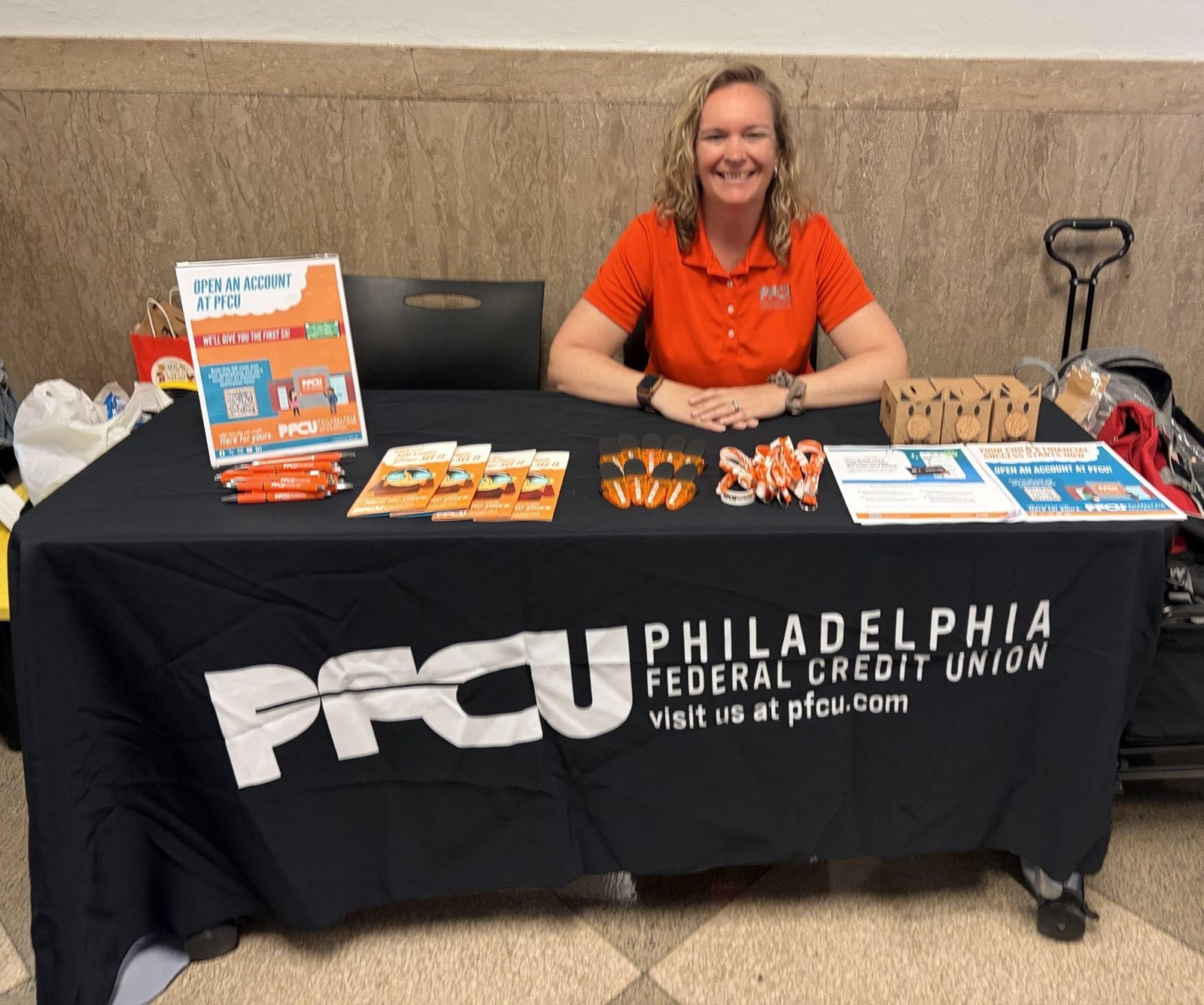 Leanne DeWitt, Business Development Manager, representing PFCU at the Philadelphia Housing Authority's 5th Annual Jump Into Summer Resource Fair.