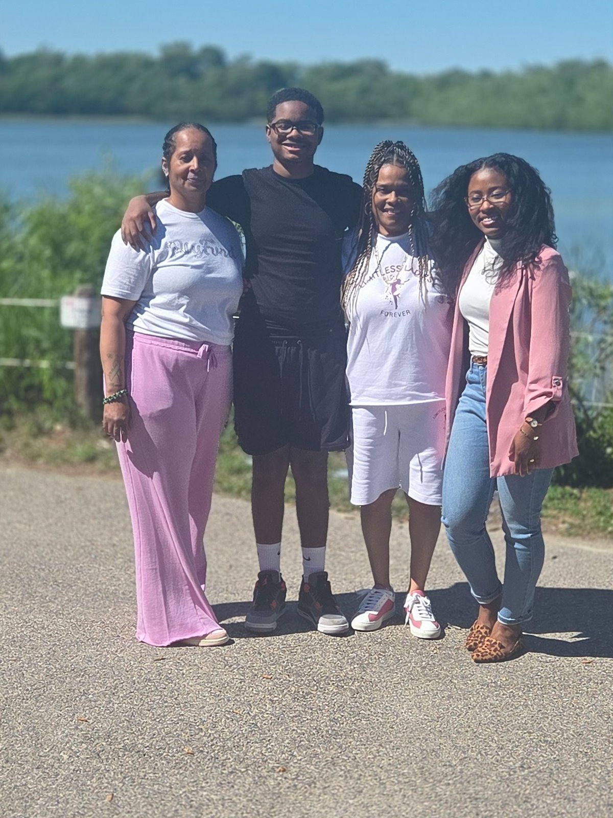 From left: Errollene Fowlkes, Assistant at Limitless Ladies Ministries; grandson of Suzette Fowlkes; Suzette Fowlkes, Founder and President of Limitless Ladies Ministries; and Yahné Jackson, PFCU Community Relations Specialist and Accredited Financial Educator.