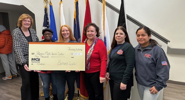From left Mary Simmons, VP, Marketing and Patricia Craven, President/CEO (center) presented the check to the representatives from the Veterans Multi-Service Center.