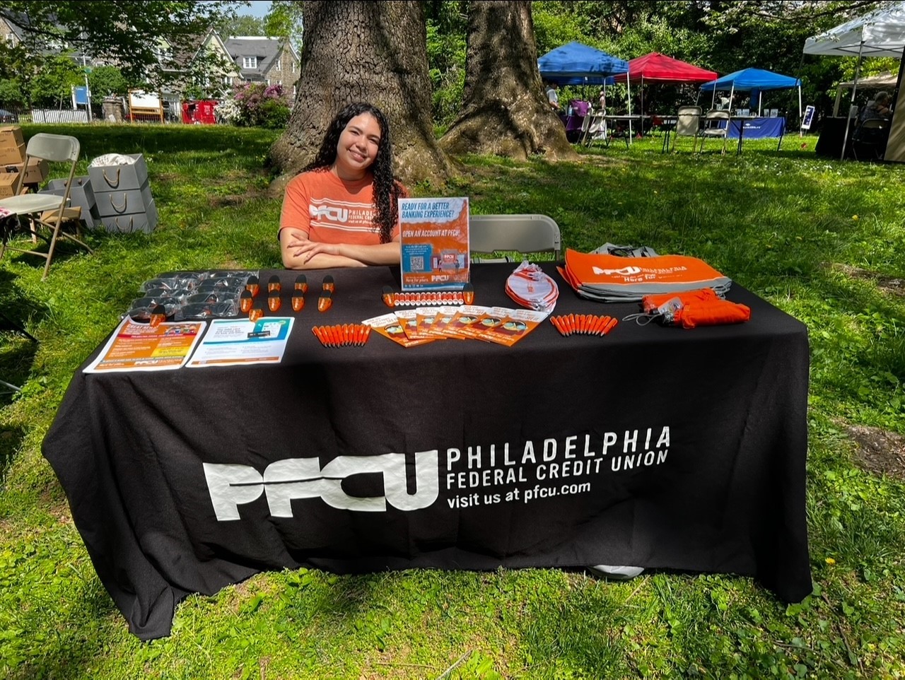 Yorkenia Gomez, PFCU’s Business Development Specialist, joined in the Mt. Airy Day celebration, engaging with community members and supporting local Philadelphia pride along Germantown Avenue.