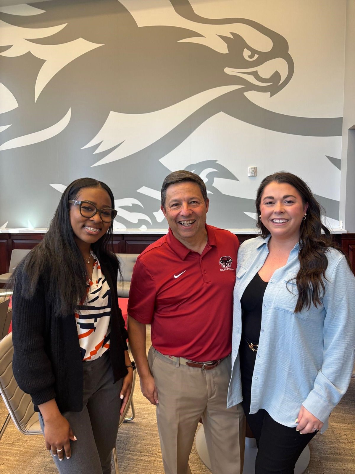 Pictured: Yahné Jackson, PFCU’s Certified Financial Counselor, and Shannon Lutz, PFCU Business Development Specialist, at SJU’s Meet the Hawks community day.
